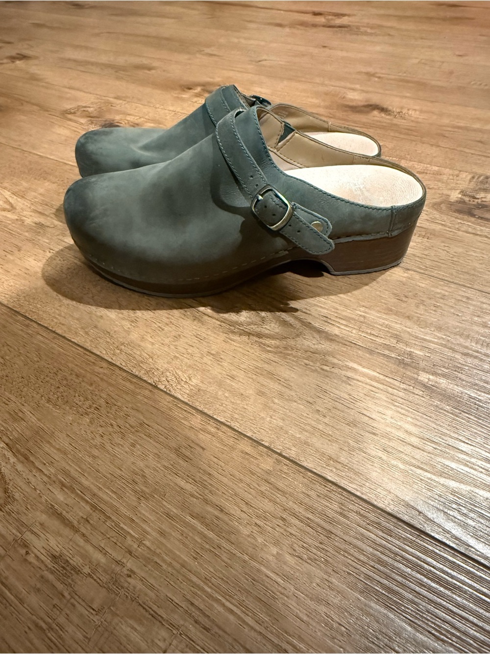 Women's Green Slip-On Dansko Clog with Buckle Strap